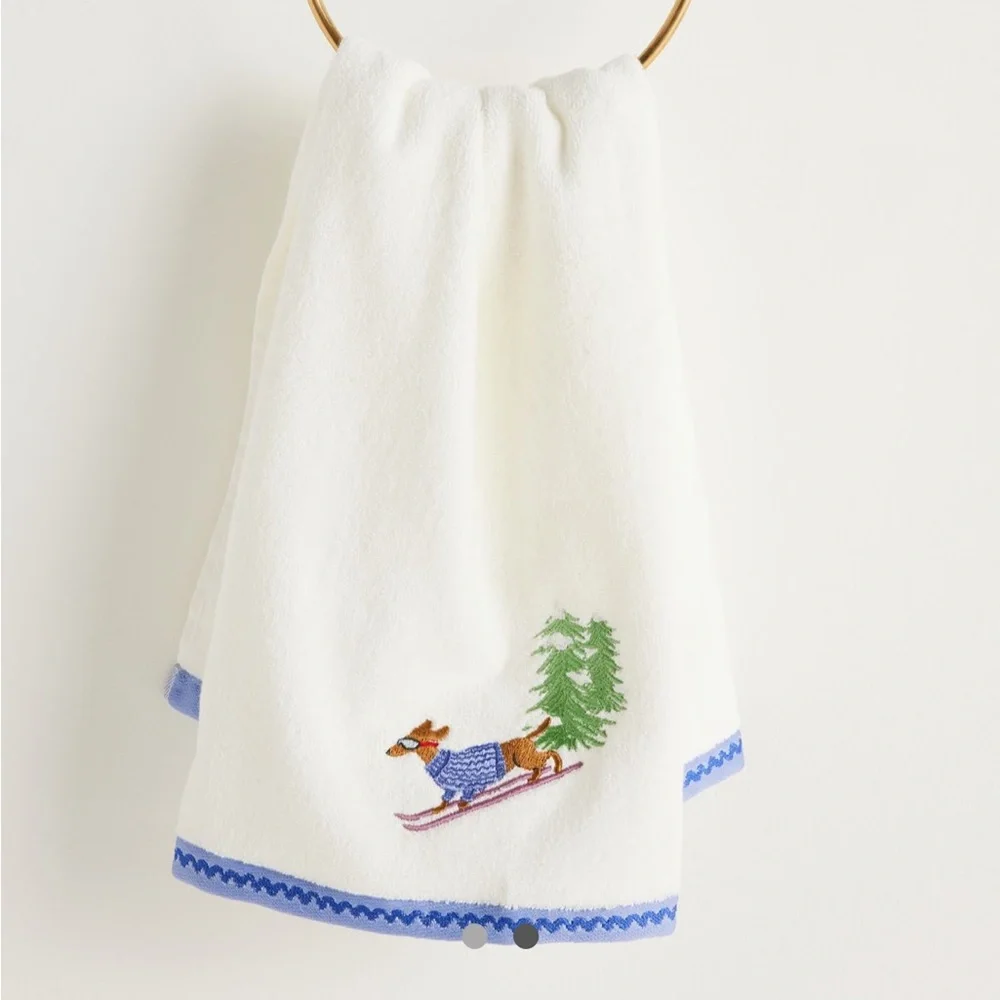 New! Anthropologie Holiday Critters Embroidered Hand Towel in white.